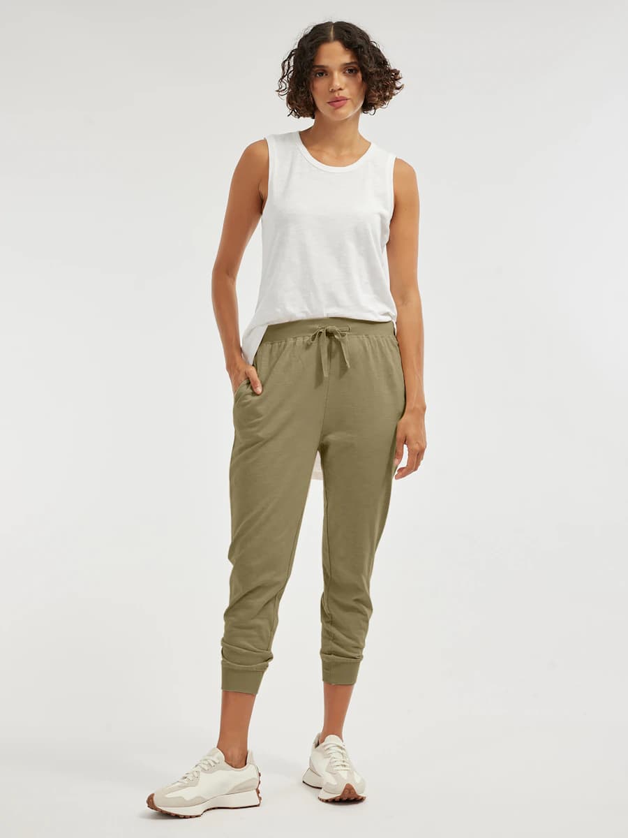 Adult model style reference — Woman olive green joggers full body